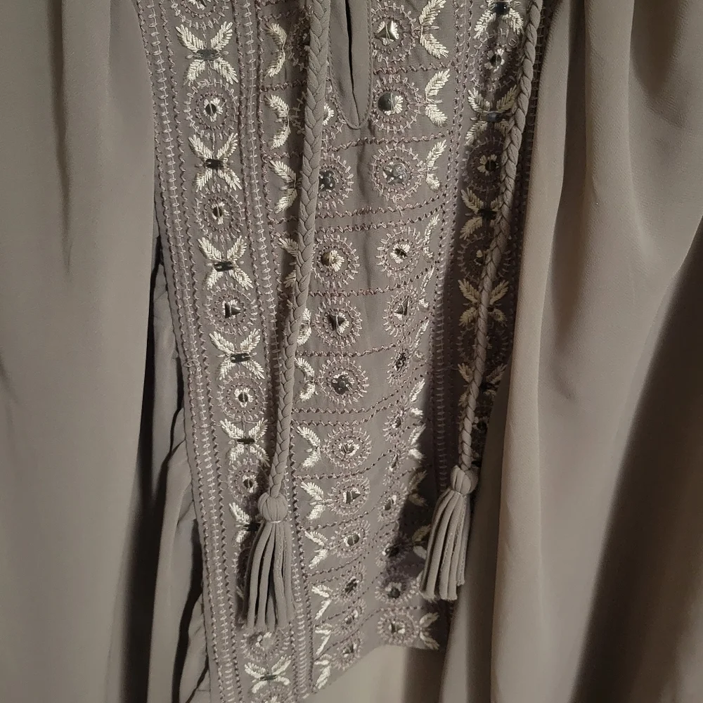 Free People embroidered oversized with tassel details boho style top size small